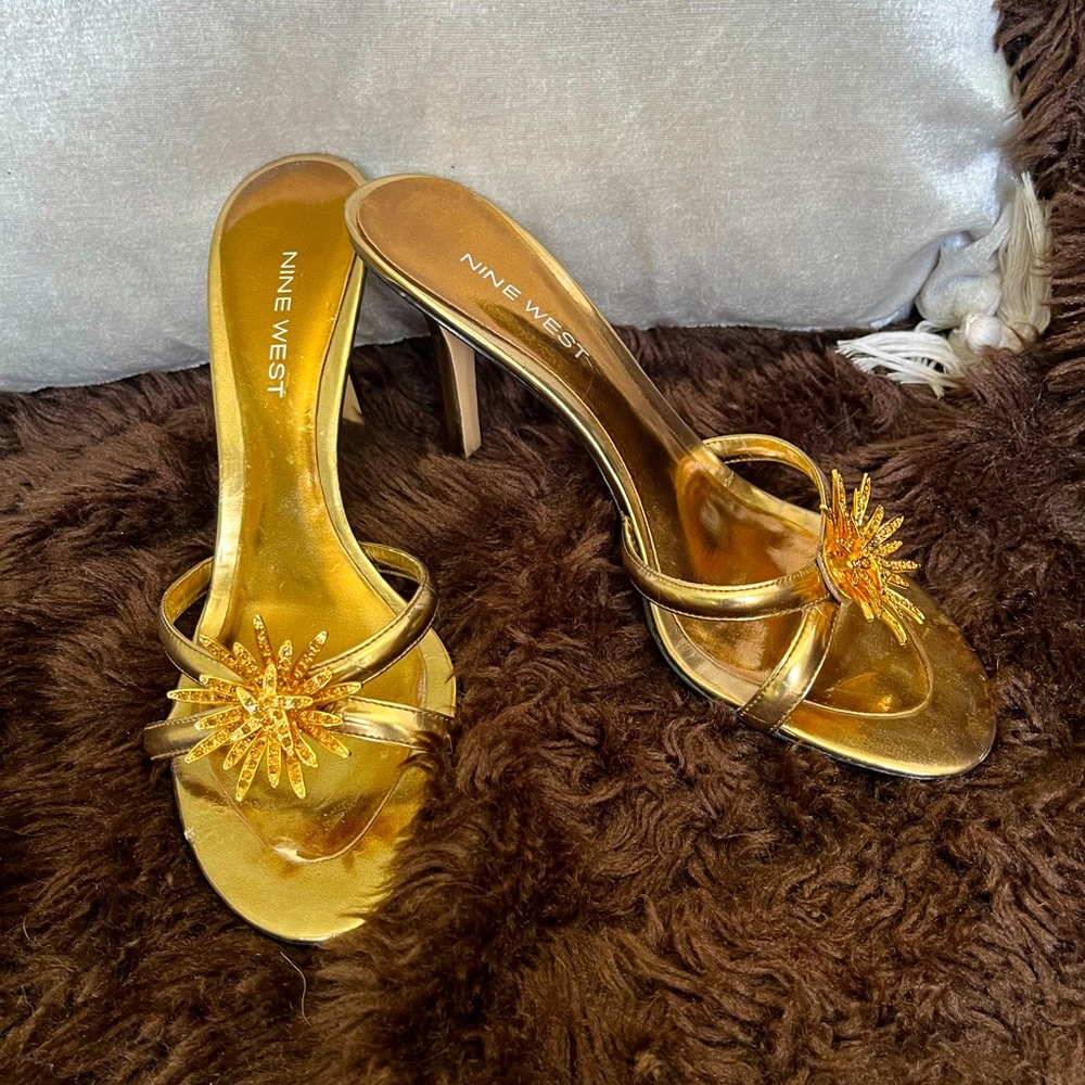 Metallic bare backs by Nine West, size 6.5, wore once. Like new!